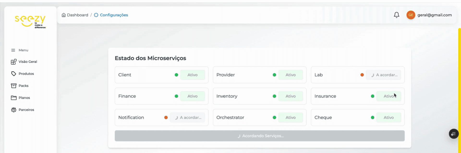 Seezy settings page showing the status of nine microservices: Client, Provider, Lab, Finance, Inventory, Insurance, Notification, Orchestrator and Cheque, most active and two waking up.